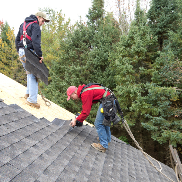 Certified Go Pro Roofing contractors working on a roof project in West Valley City