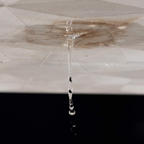 Water stain forming on ceiling under roof leak
